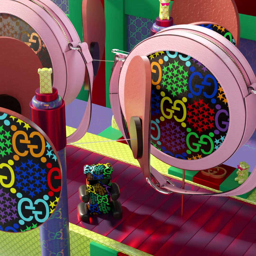 Round pink bags carrying the same print, hanging in a green and red room with a small printed bear below.
