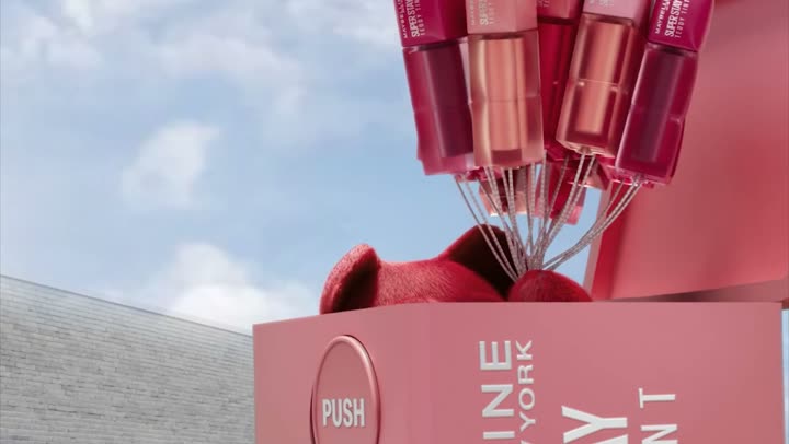Tubes of the tint bursting out of the top of the giant box.