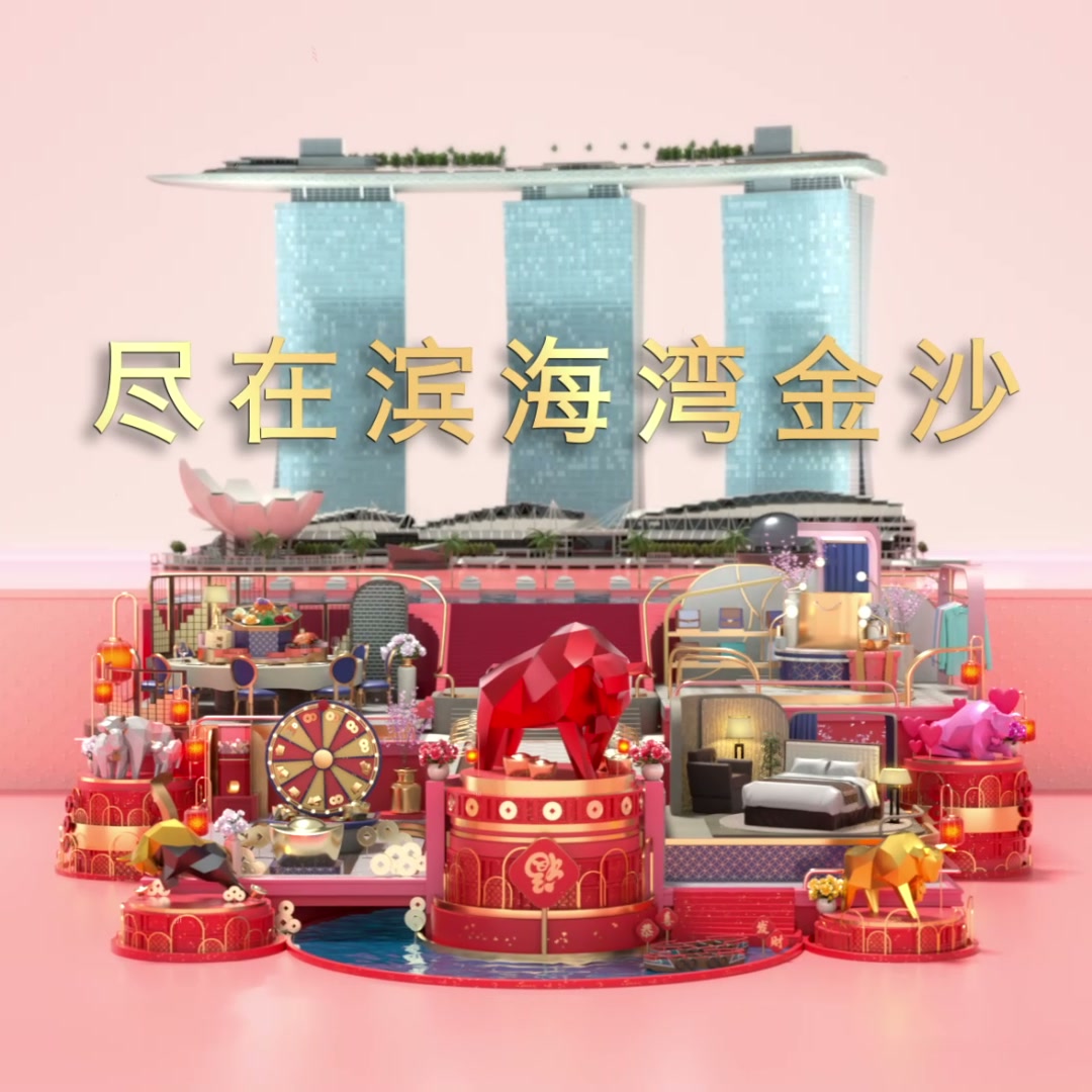 The full festive set with a red ox at its centre and the Marina Bay Sands towers behind.