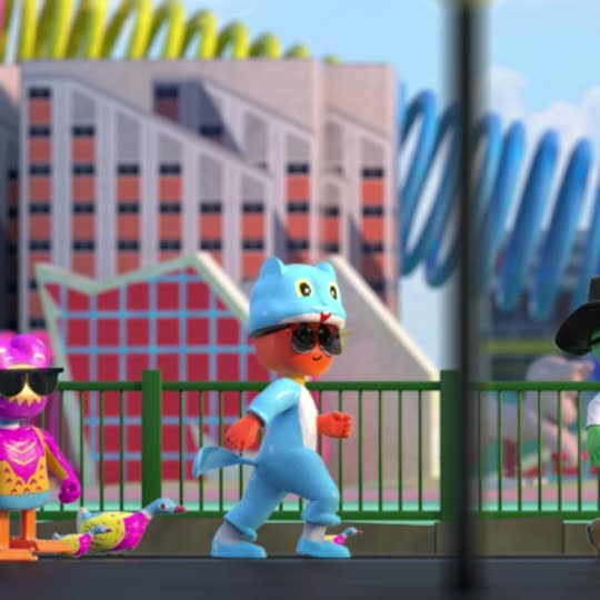 A pale blue cat with yellow ears and dark sunglasses, mid stride.